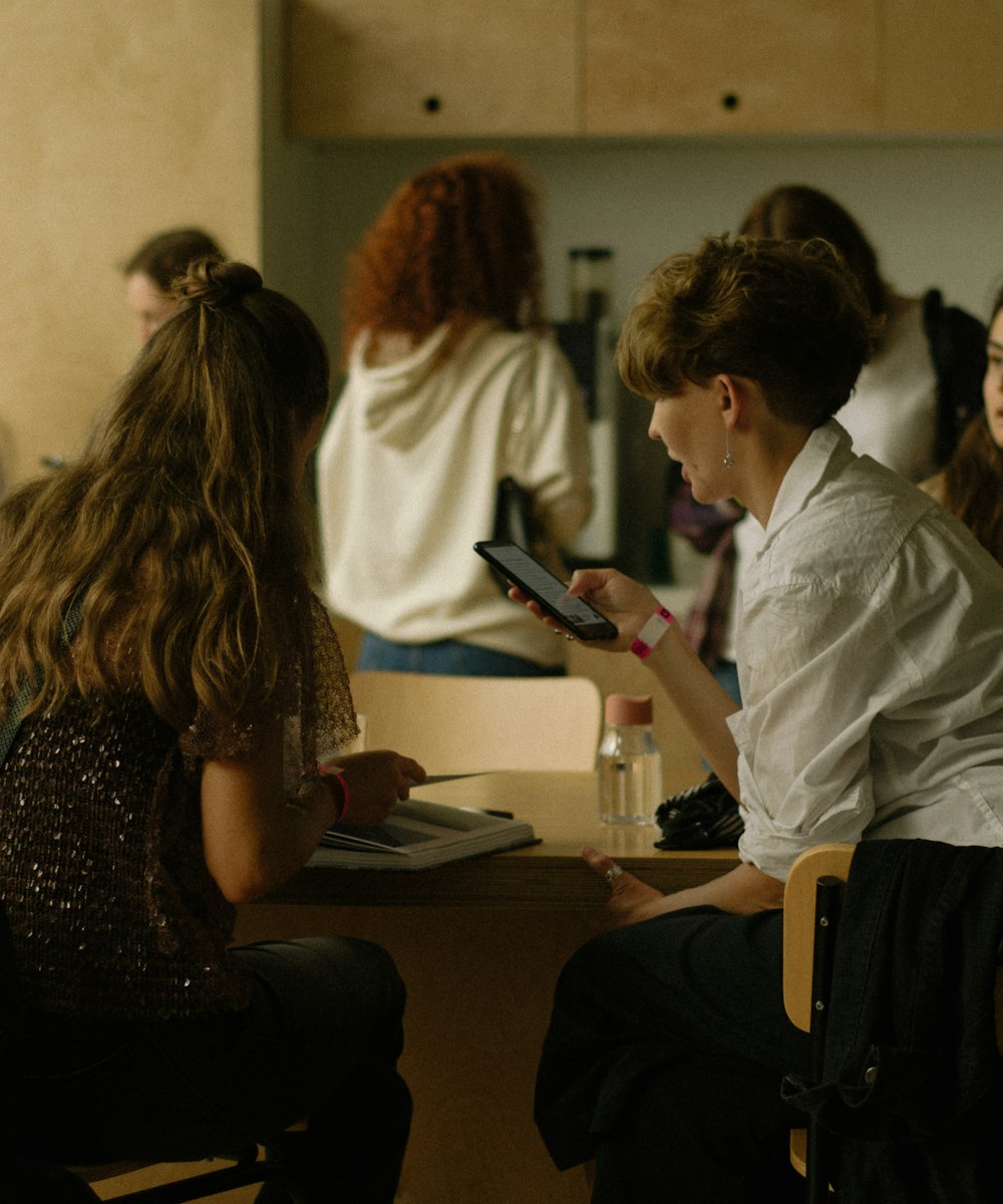 A small group sitting together around a table